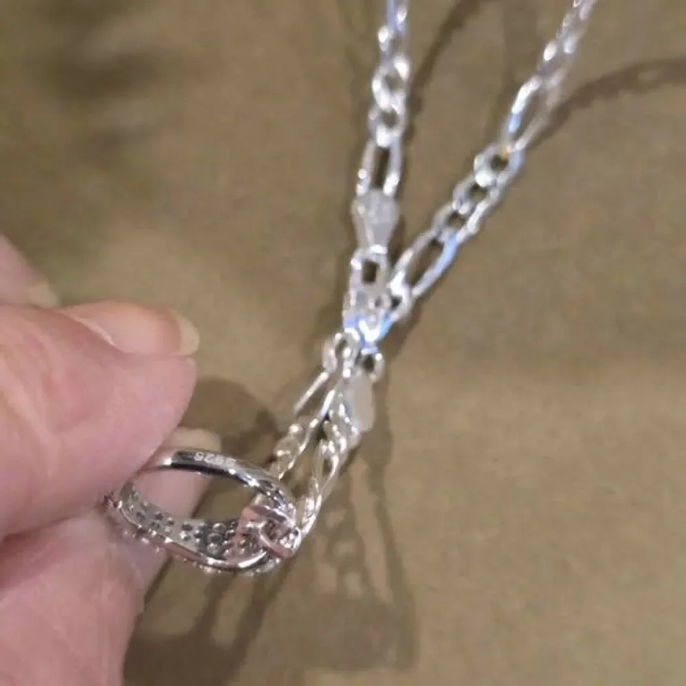 Moissanite Cross on 20